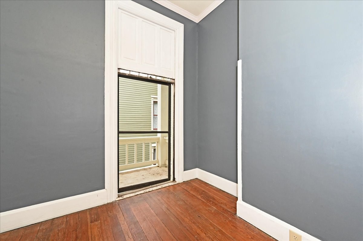 426 Sherman Street Southeast Decatur, AL 35601 - Photo 28 of 41 a view of an empty room with wooden floor