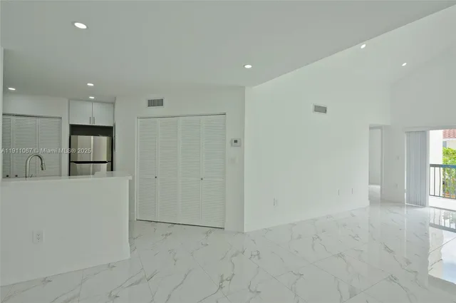 a view of a kitchen with a sink