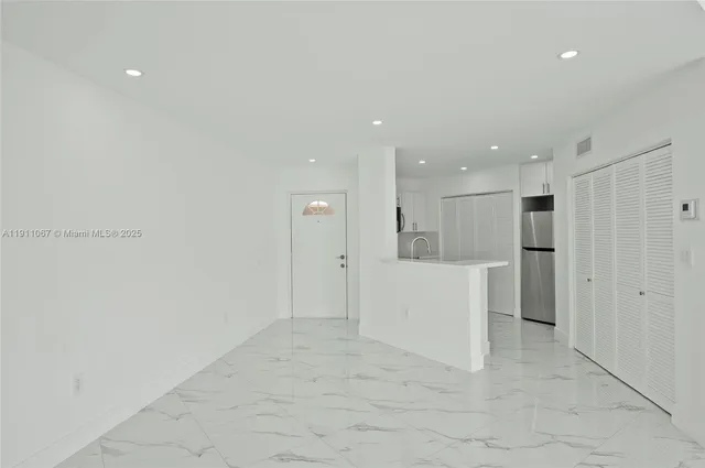 en empty room with windows