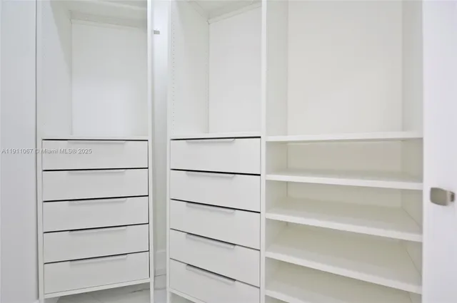 a bathroom with a toilet a sink and shower