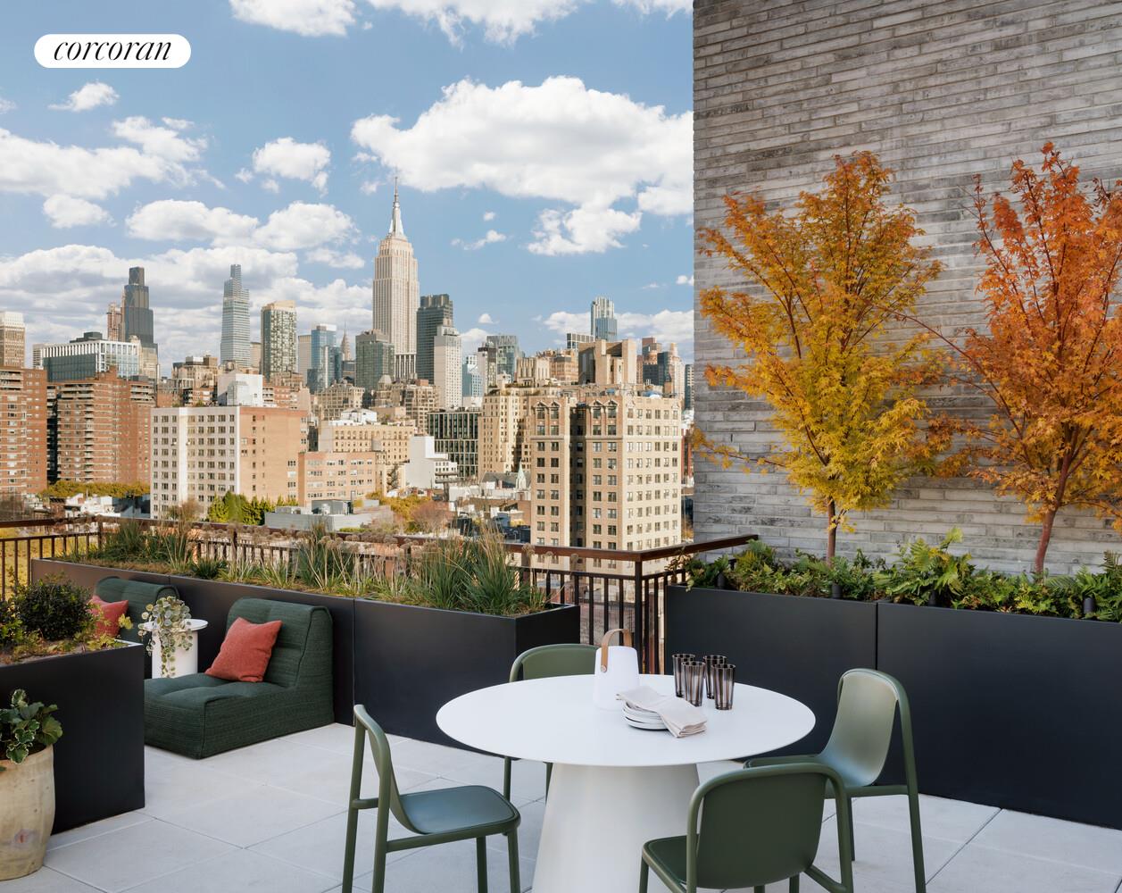 428 West 19th Street, Unit 8A Manhattan, NY 10011 - Photo 12 of 18 a balcony with table and chairs