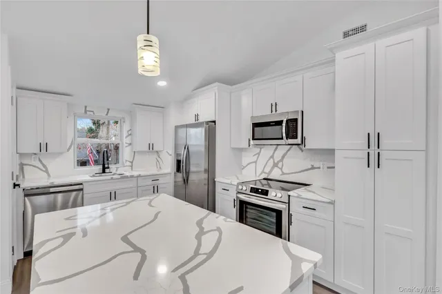 $599,000 | 567 Puritan Drive, Shirley, NY 11967