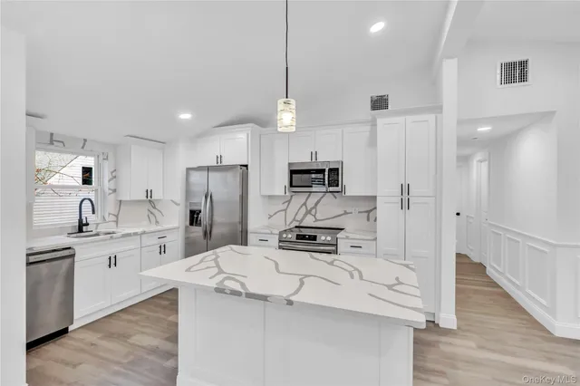 $599,000 | 567 Puritan Drive, Shirley, NY 11967