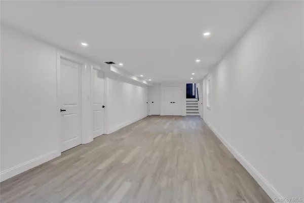 a bathroom with a shower toilet and sink