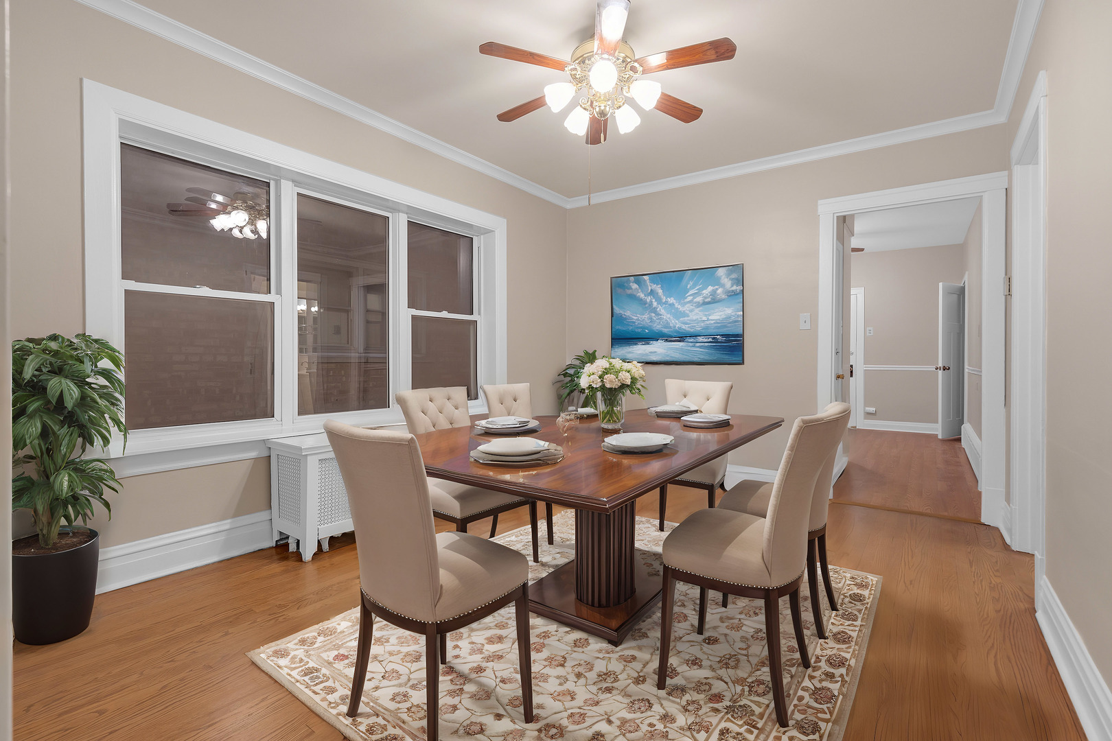 6138 North Meade Avenue Chicago, IL 60646 - Photo 6 of 32 a view of a dining room with furniture and wooden floor