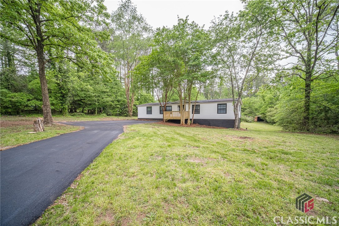 3520 Haynes Ridge Road Northeast Loganville, GA 30052 - Photo 3 of 47 Gallery Image 3