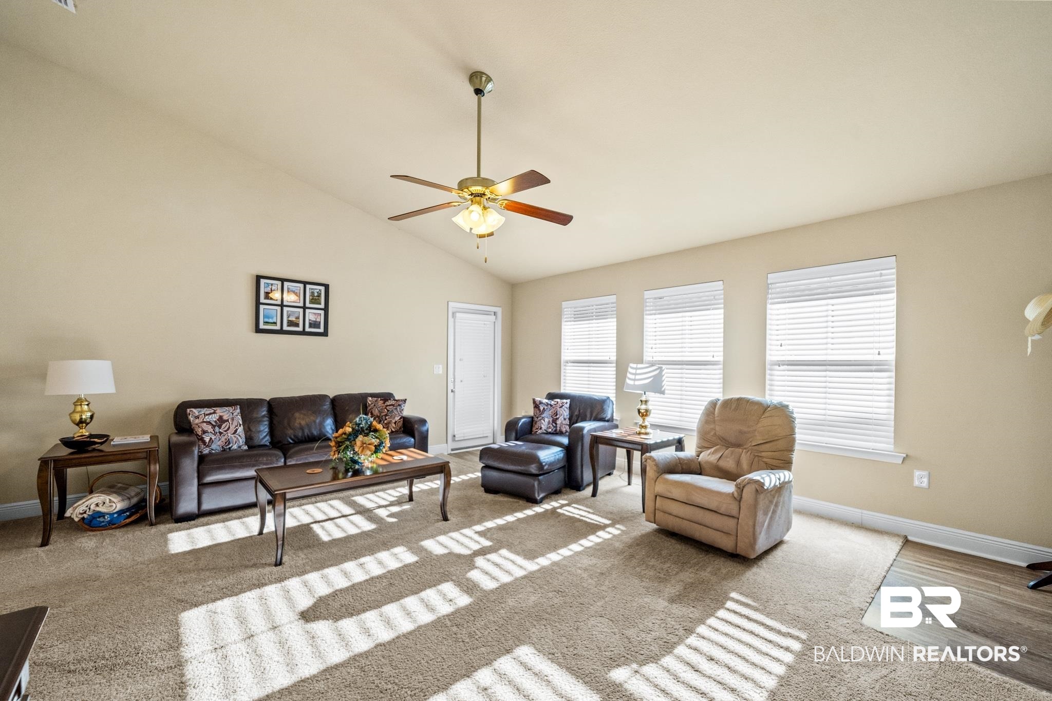 17069 Russet Court Foley, AL 36535 - Photo 5 of 27 Carpeted living room featuring high vaulted ceiling and ceiling fan