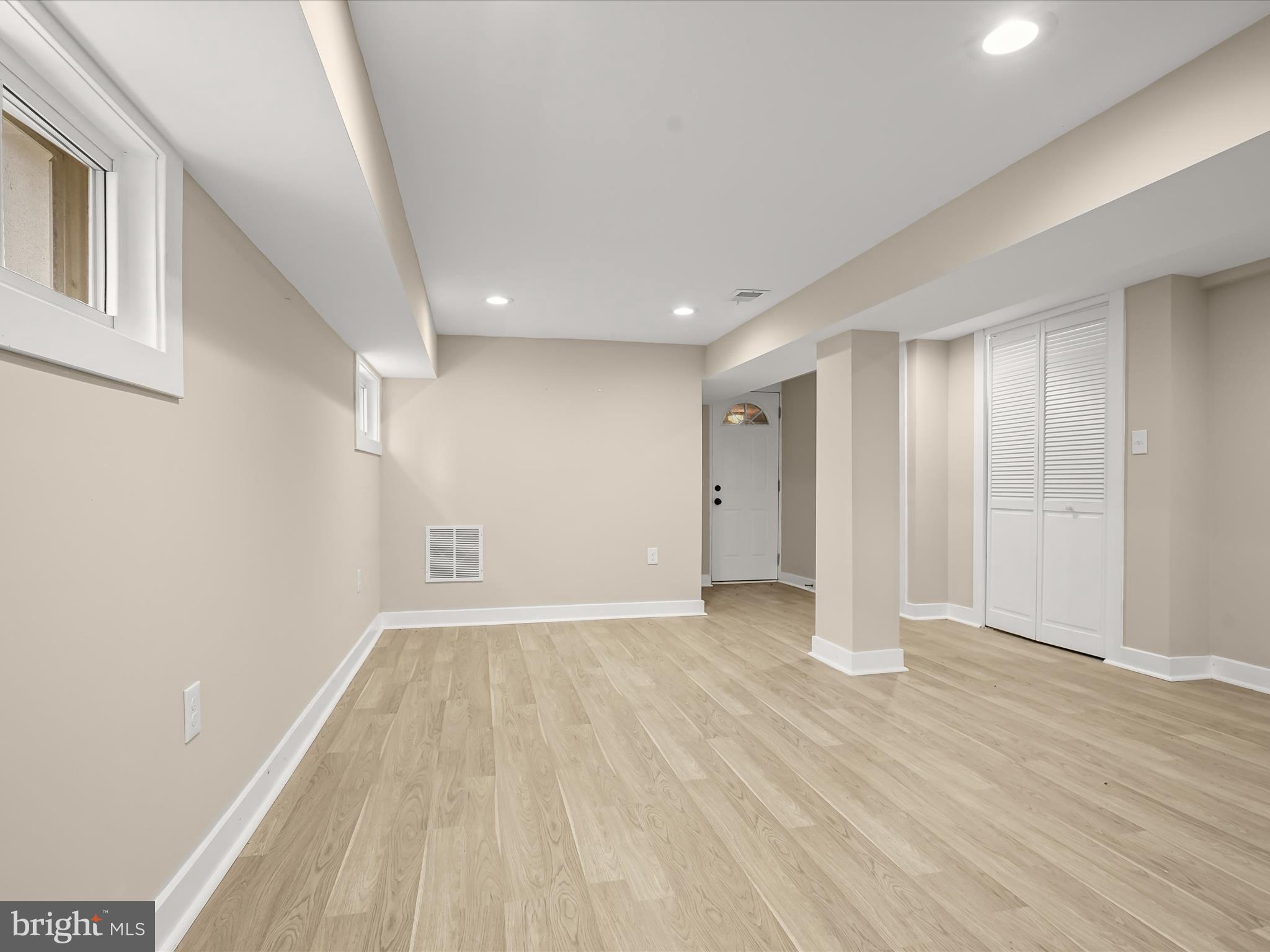 5728 8th Street Northwest Washington, DC 20011 - Photo 39 of 50 a view of an empty room with wooden floor