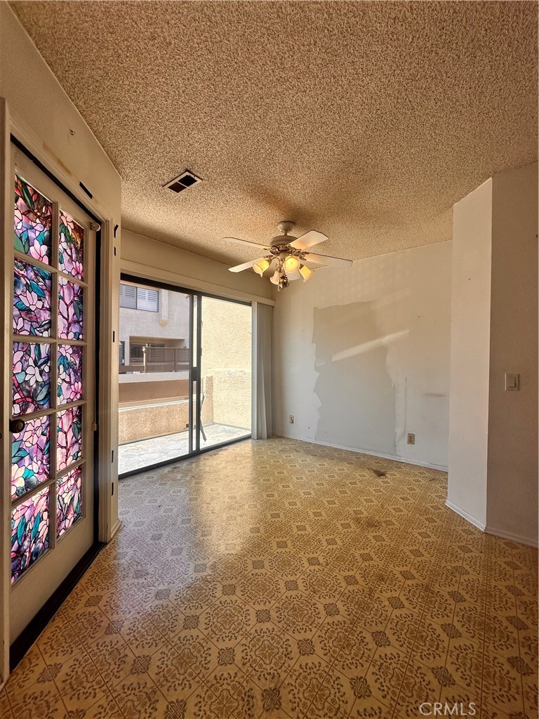 7 Wilderness Place Pomona, CA 91766 - Photo 11 of 26 a view of an empty room with a window