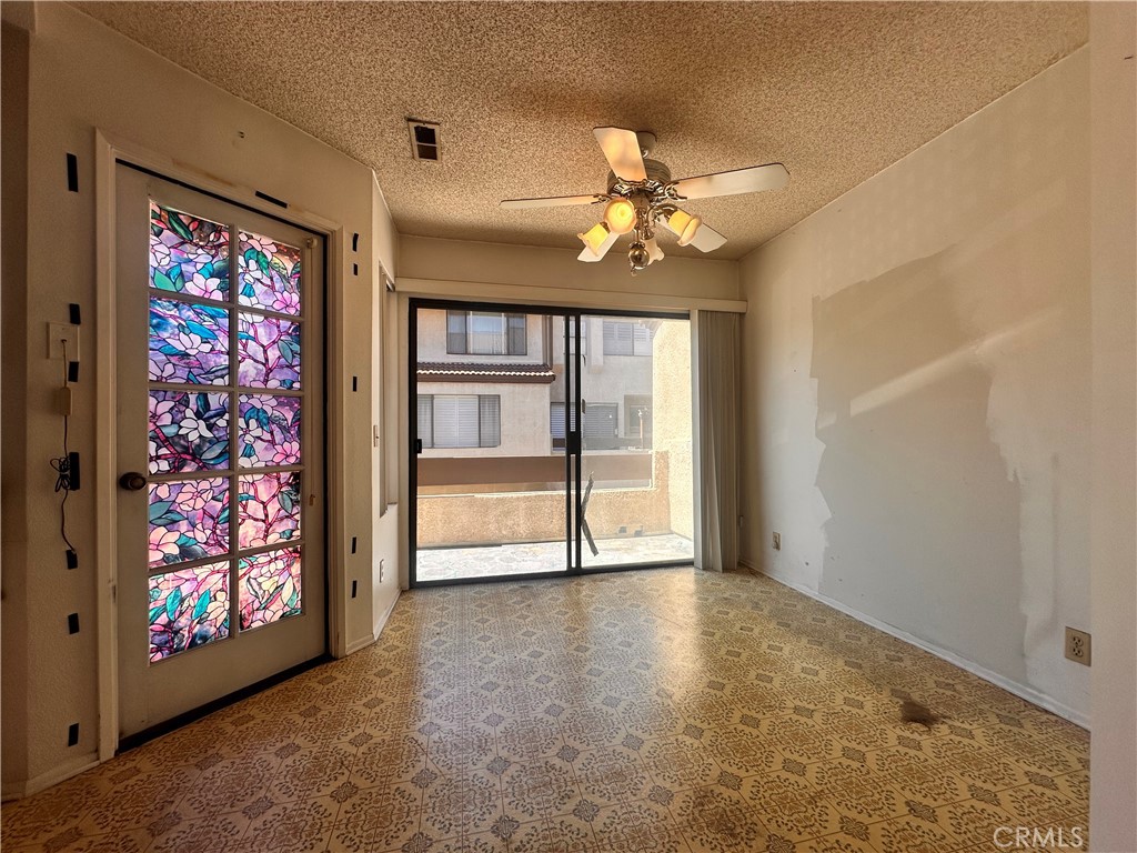 7 Wilderness Place Pomona, CA 91766 - Photo 13 of 26 a view of an empty room with a window