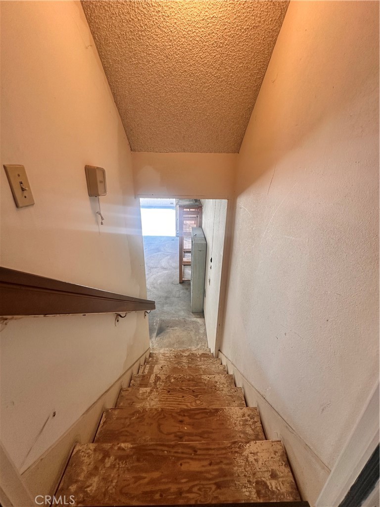 7 Wilderness Place Pomona, CA 91766 - Photo 22 of 26 a view of a room with door