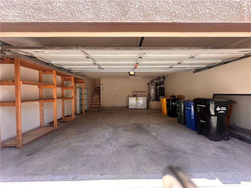 7 Wilderness Place Pomona, CA 91766 - Photo 24 of 26 a view of a garage with wooden wall
