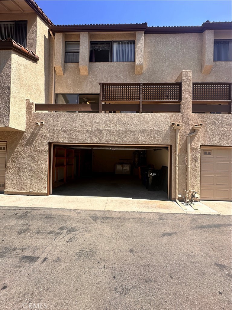 7 Wilderness Place Pomona, CA 91766 - Photo 26 of 26 a view of house with outdoor space