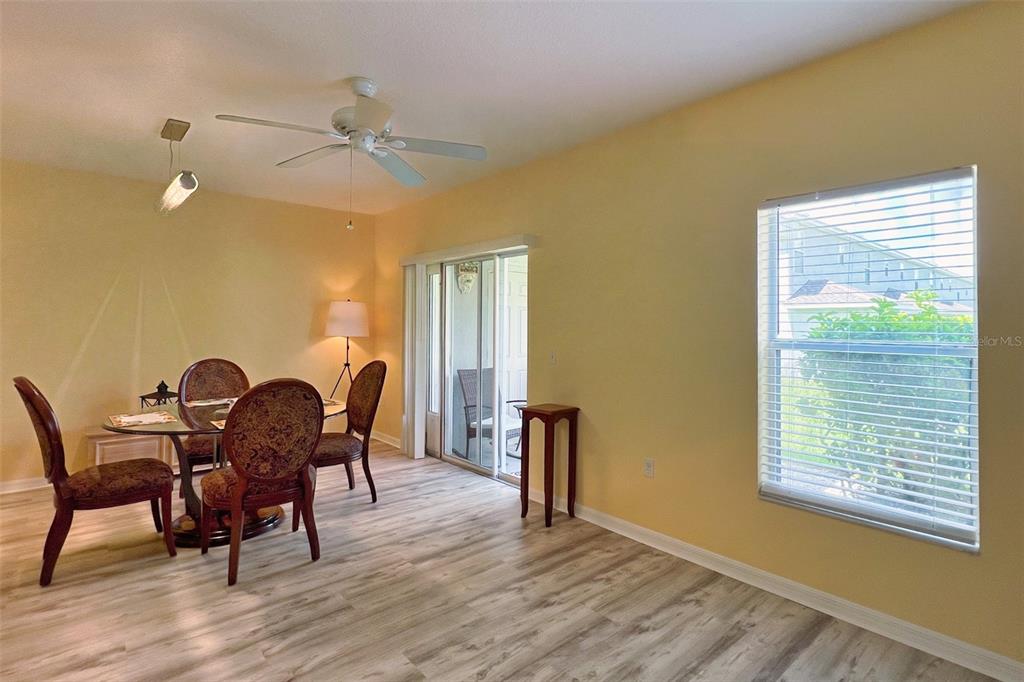 14741 Amberjack Terrace Lakewood Ranch, FL 34202 - Photo 14 of 48 a dining room with furniture and window