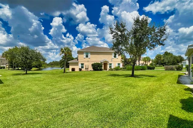 a view of swimming pool with a yard