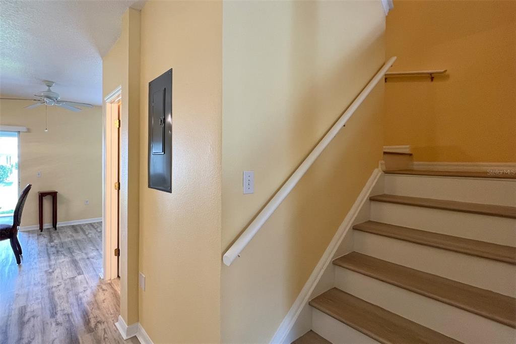 14741 Amberjack Terrace Lakewood Ranch, FL 34202 - Photo 19 of 48 a view of entryway and hall with wooden floor