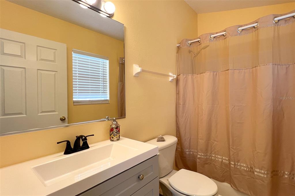 14741 Amberjack Terrace Lakewood Ranch, FL 34202 - Photo 24 of 48 a bathroom with a sink a toilet and shower