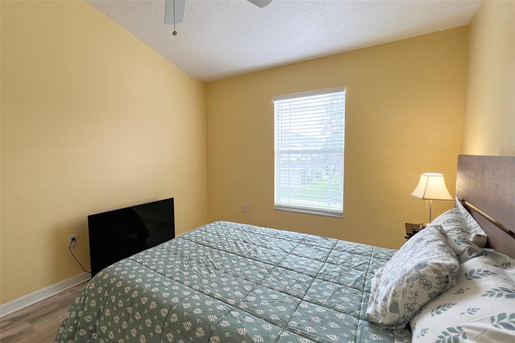 14741 Amberjack Terrace Lakewood Ranch, FL 34202 - Photo 31 of 48 a bedroom with a bed and a window