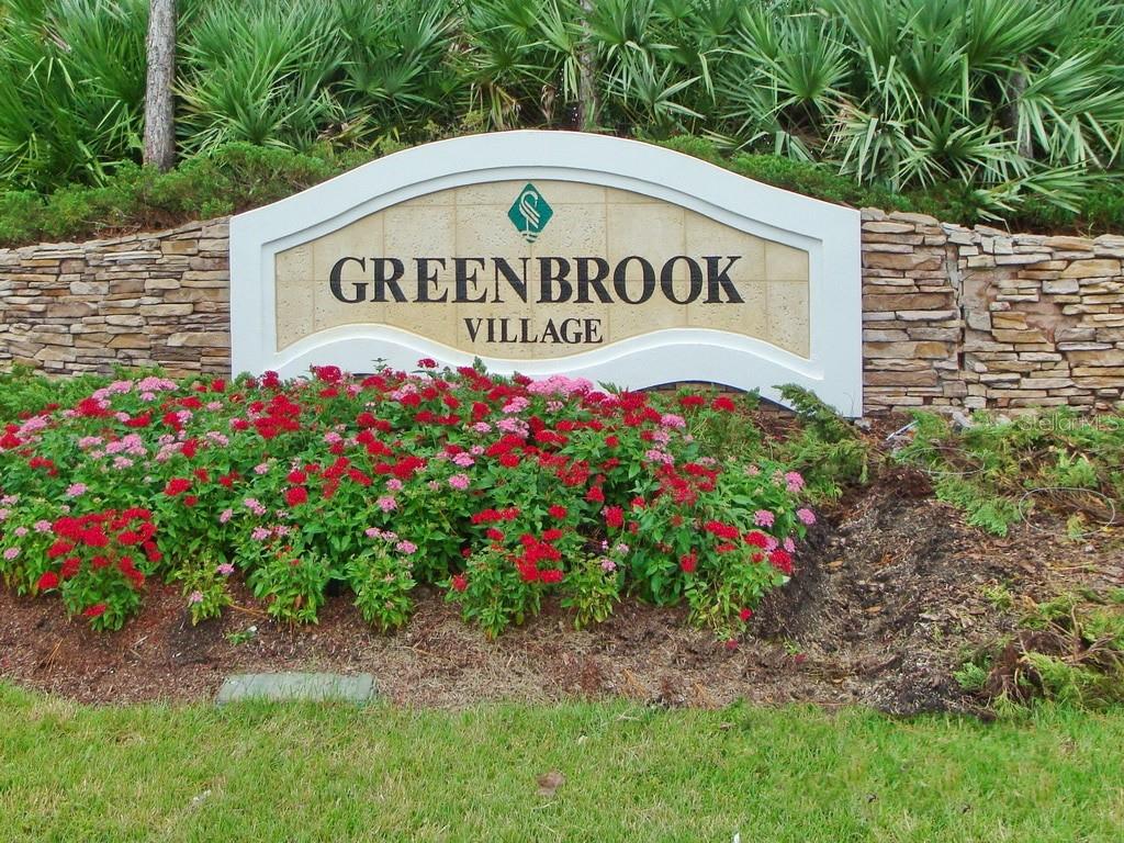 14741 Amberjack Terrace Lakewood Ranch, FL 34202 - Photo 35 of 48 a sign broad in front of flowers