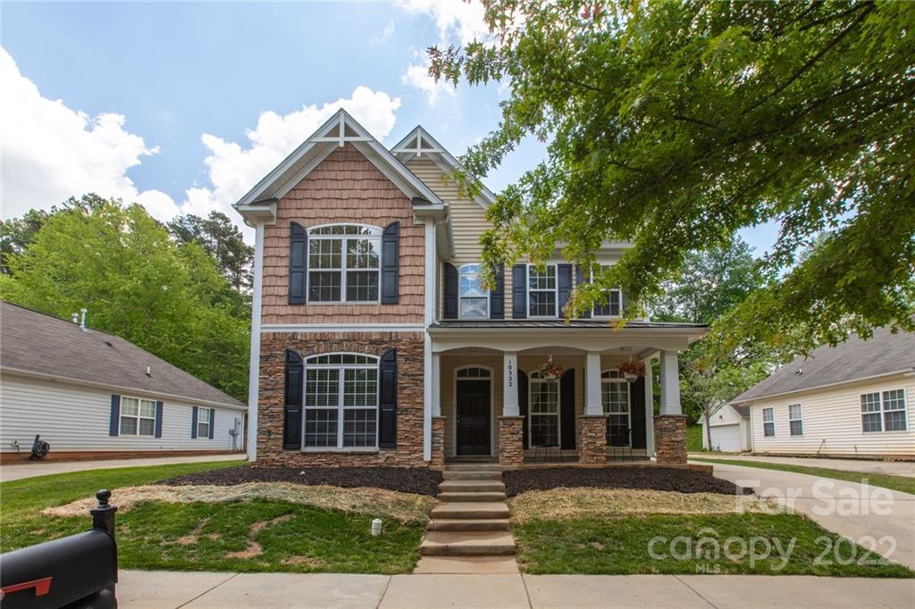 10322 Caldwell Depot Road Cornelius, NC 28031 - Photo 1 of 21 front view of a house with a yard