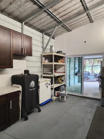 a view of livingroom with workspace