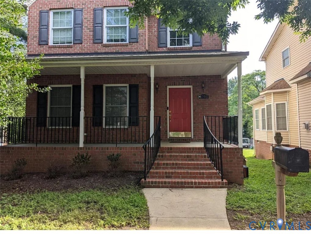 1701 Lakeview Avenue Richmond, VA 23220 - Photo 1 of 1 a front view of a house with a yard