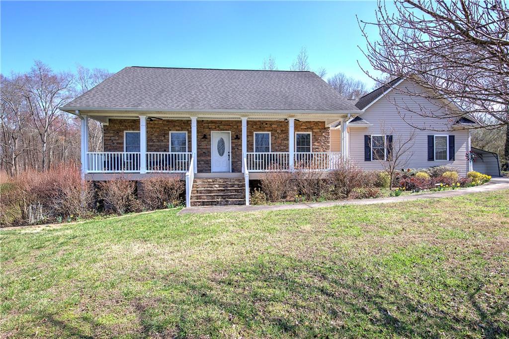 1005 Harmony Road Southeast Aragon, GA 30104 - Photo 1 of 40 front view of a house with a yard