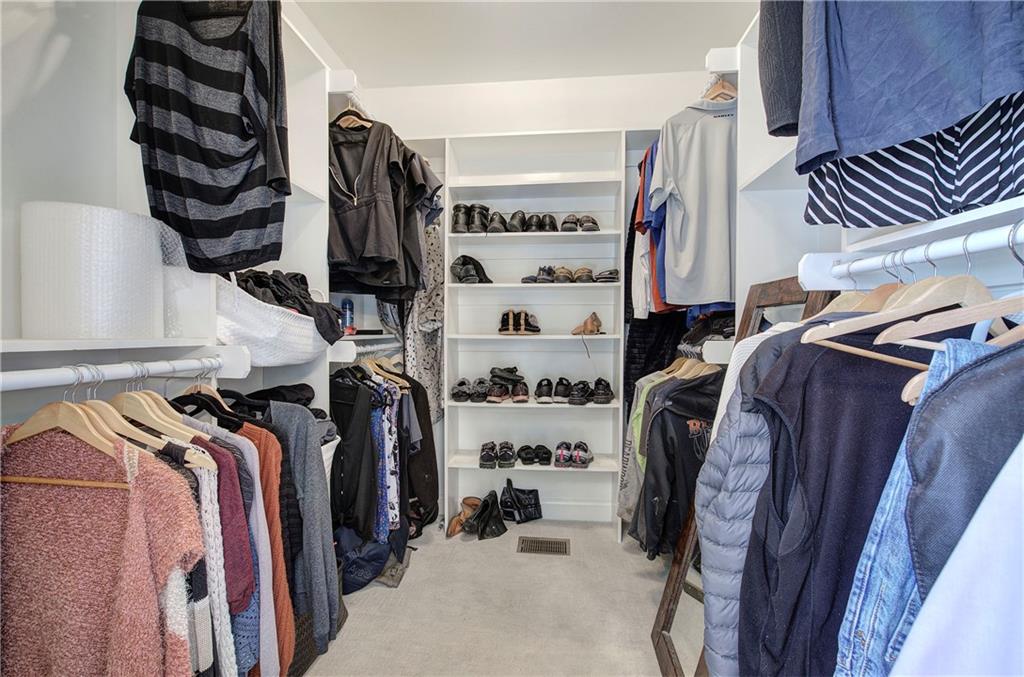 1005 Harmony Road Southeast Aragon, GA 30104 - Photo 32 of 40 a view of walk in closet with clothes and shoes