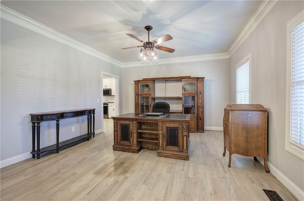 1005 Harmony Road Southeast Aragon, GA 30104 - Photo 5 of 40 a view of a workspace with furniture and a window