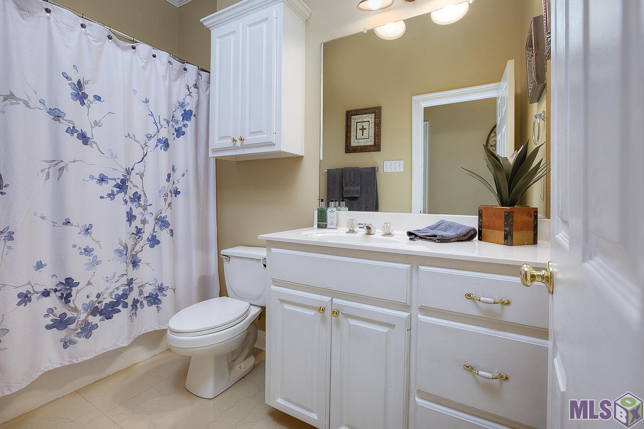 18542 Perkins Road Prairieville, LA 70769 - Photo 25 of 36 Second Guest Bathroom