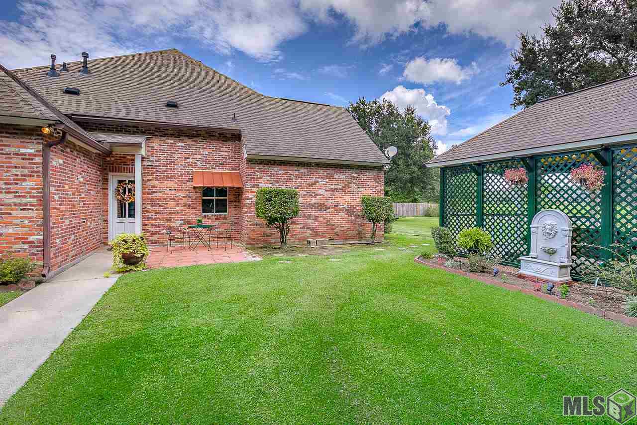 18542 Perkins Road Prairieville, LA 70769 - Photo 29 of 36 Side Patio