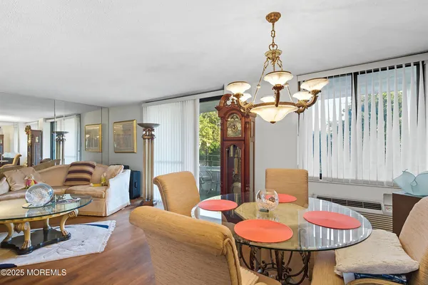 a view of a chairs and table in a patio
