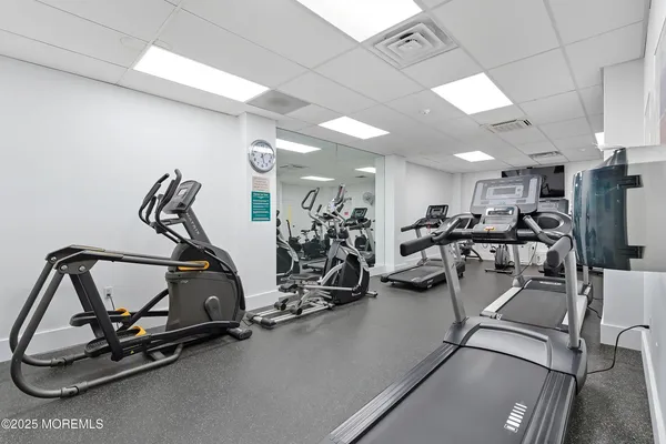 a view of wooden floor and shower