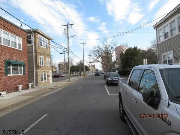 a view of street with cars