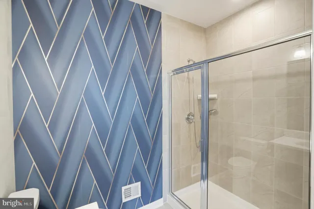 a view of a livingroom with a flat screen tv