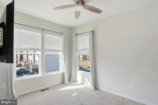 a view of a livingroom with a flat screen tv