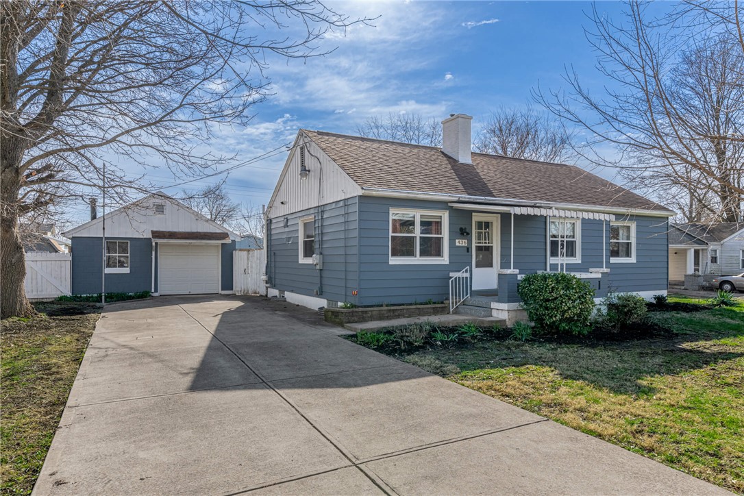 436 Marjorie Avenue Riverside, OH 45404 - Photo 2 of 34 This charming residence features a well-maintained exterior and a convenient driveway leading to a detached garage.