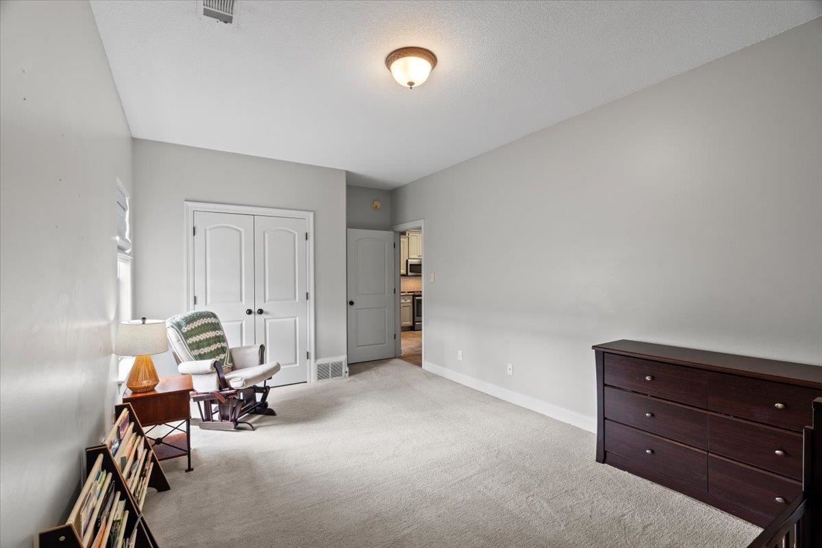 4740 Wellsgate Point Bartlett, TN 38135 - Photo 19 of 36 a room with a chair and gym equipment