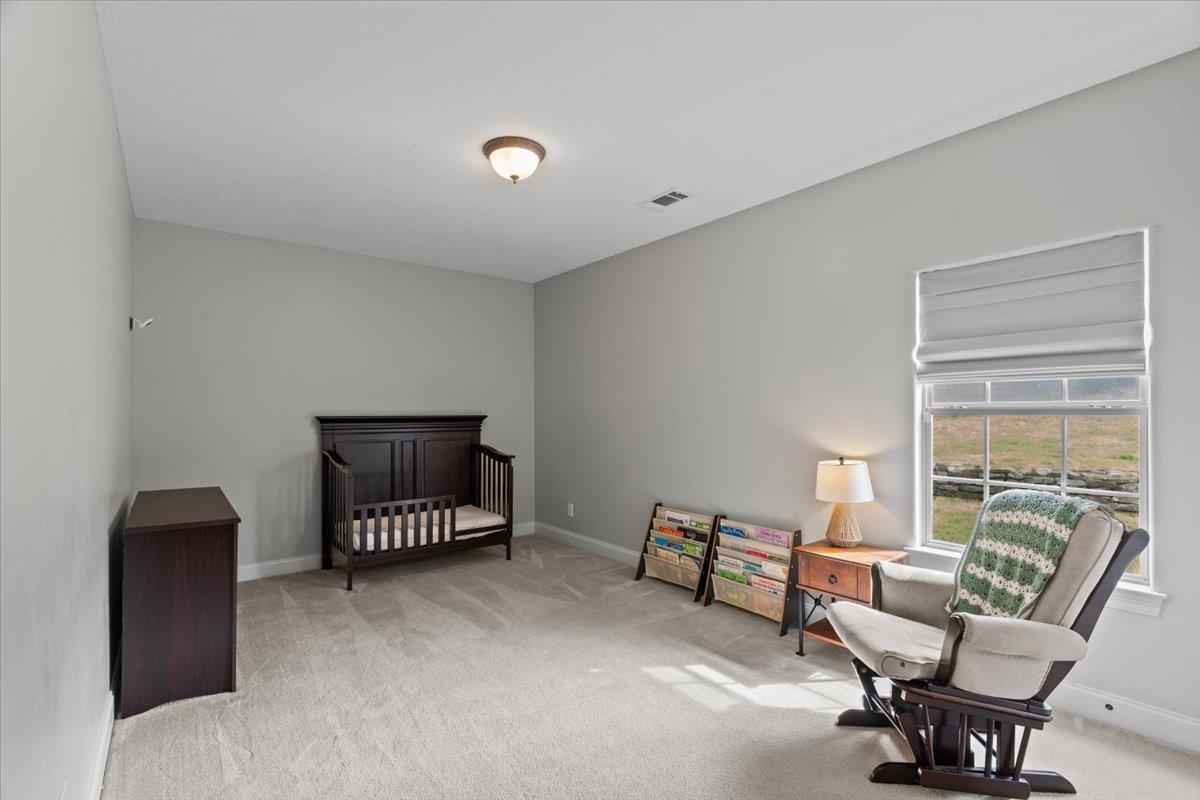 4740 Wellsgate Point Bartlett, TN 38135 - Photo 20 of 36 a view of livingroom with furniture and windows