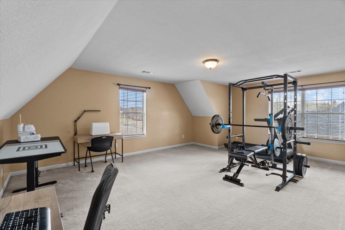 4740 Wellsgate Point Bartlett, TN 38135 - Photo 25 of 36 a view of a workspace with furniture and a window