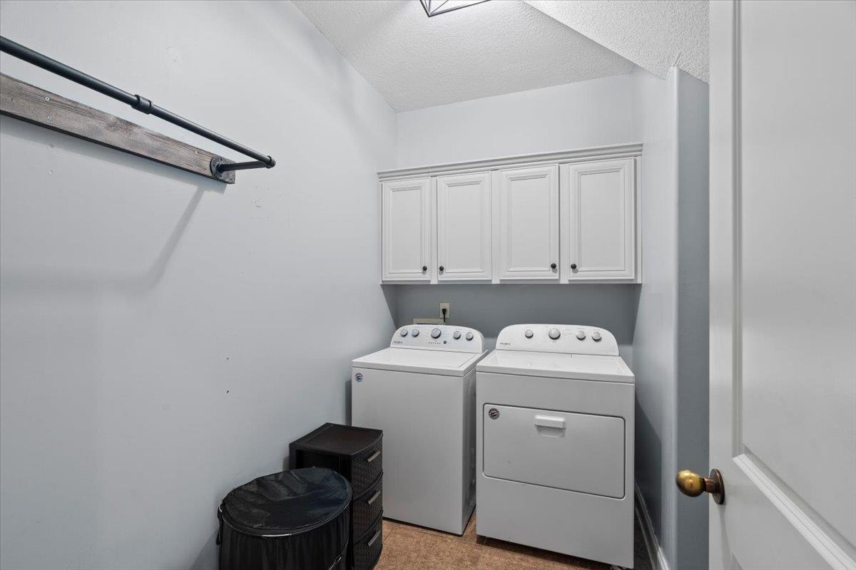 4740 Wellsgate Point Bartlett, TN 38135 - Photo 28 of 36 a utility room with dryer and washer
