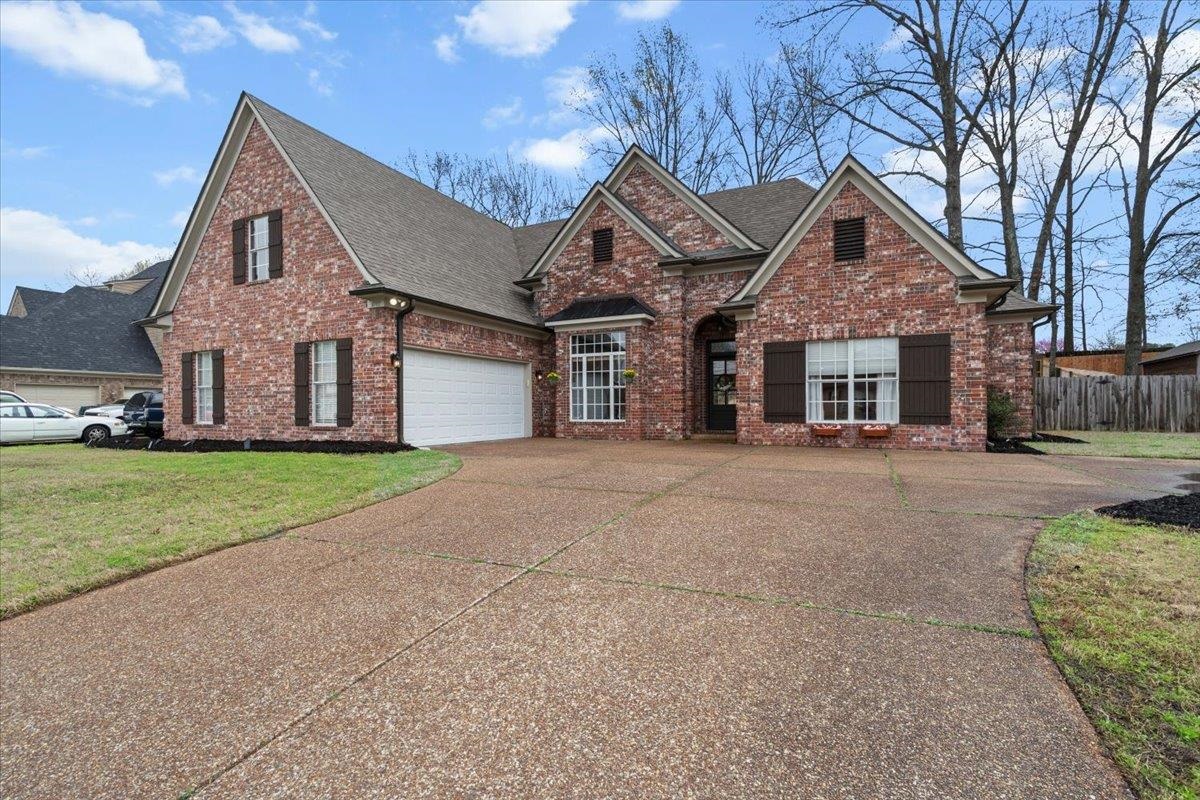 4740 Wellsgate Point Bartlett, TN 38135 - Photo 3 of 36 a view of a house with a yard