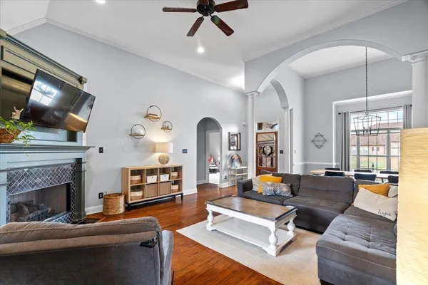 a kitchen with stainless steel appliances granite countertop a refrigerator a stove and a sink