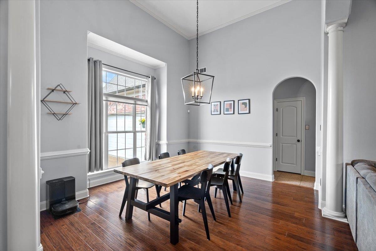 4740 Wellsgate Point Bartlett, TN 38135 - Photo 6 of 36 a view of a dining room with furniture window and wooden floor