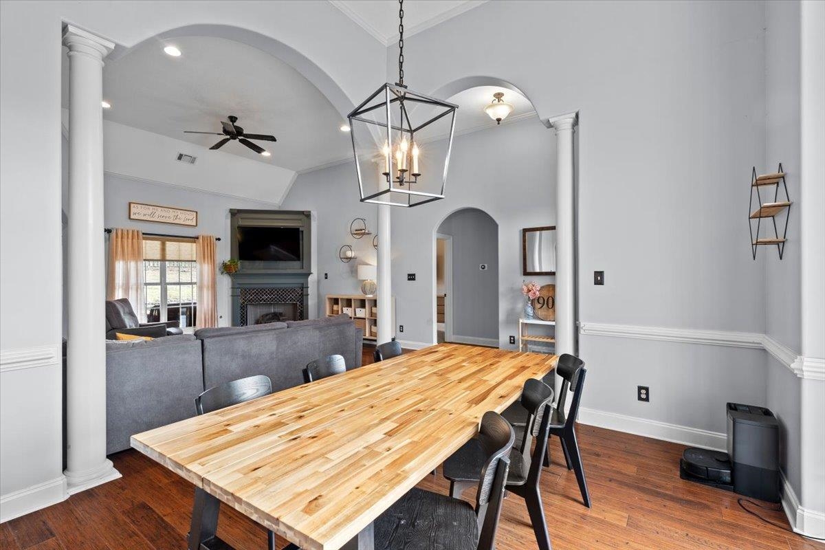 4740 Wellsgate Point Bartlett, TN 38135 - Photo 7 of 36 a view of a dining room with furniture and wooden floor