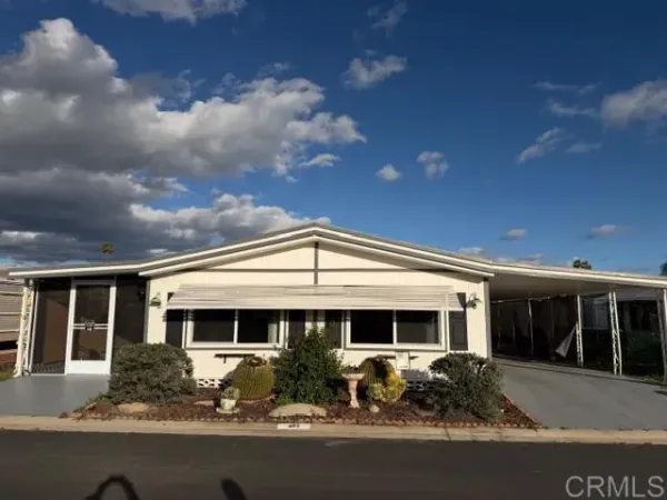 a front view of house with yard