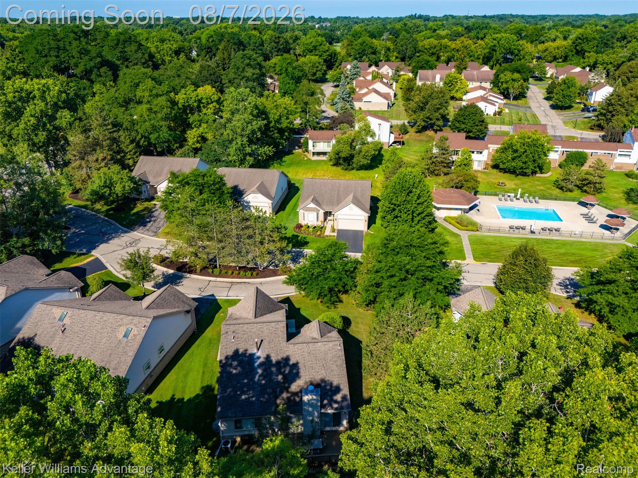 5325 Simpson Lake Road West Bloomfield, MI 48323 - Photo 38 of 43 Residential community featuring mature trees, manicured lawns, a swimming pool, and dedicated recreation areas