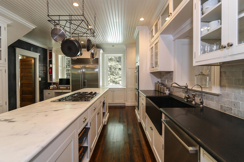 17 Goodwives River Road Darien, CT 06820 - Photo 14 of 51 a kitchen with a sink and stove