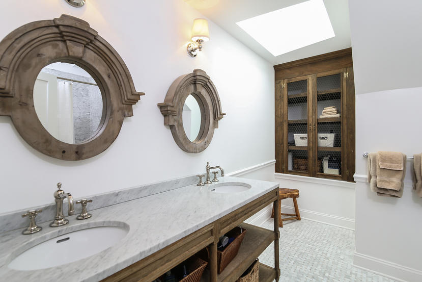 17 Goodwives River Road Darien, CT 06820 - Photo 33 of 51 a bathroom with a sink and a mirror