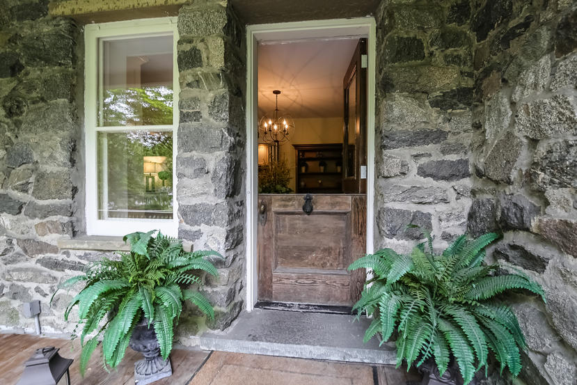17 Goodwives River Road Darien, CT 06820 - Photo 4 of 51 a view of a entryway door front of house